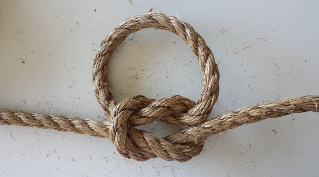 Tie a square knot 5